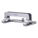 UGREEN 20471 – Soporte Vertical para Laptop / Ajustable 12-26 mm / Aluminio y Silicona / Hasta 15.6 pulgadas / Base Antideslizante / Color Plata